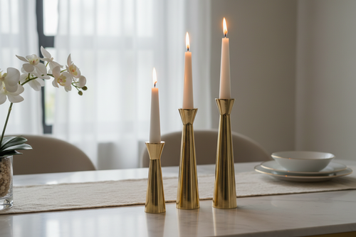 Brass Candle Holder Set on marble dining table with taper candles